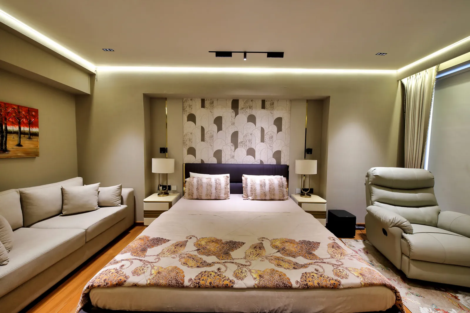 Bedroom with a sofa and a recliner (photograph)